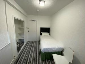 Postel nebo postele na pokoji v ubytování Aaran Central Guesthouse