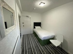Postel nebo postele na pokoji v ubytování Aaran Central Guesthouse