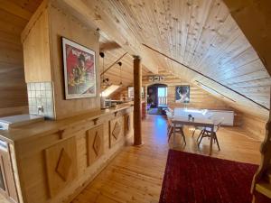 a large room with a table in a cabin at Appartement Les Angles, 4 pièces, 6 personnes - FR-1-758-11 in Les Angles