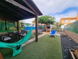 Imagen de la galería de ideal remote work, relaxing, pool and surfing, en Corralejo