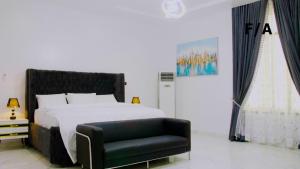 Favourite Luxury 2 Bedroom Apartment tesisinde bir odada yatak veya yataklar