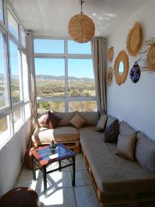 Posezení v ubytování Bel appartement refait à neuf Bahia Smir