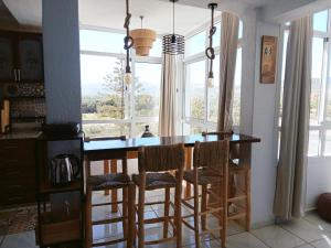 Kuchyň nebo kuchyňský kout v ubytování Bel appartement refait à neuf Bahia Smir + 12 fotografií