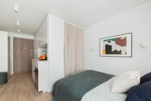 Postel nebo postele na pokoji v ubytování Apartment in Žvėrynas