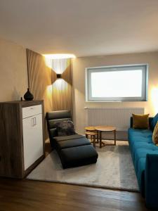 Posezení v ubytování Haus mit Sauna am Waldrand - Nähe Brombachsee Altmühlsee