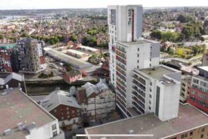 an aerial view of a city with tall buildings at Spacious Luxury Waterfront Apartment in Ipswich