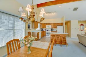 a kitchen and dining room with a table and chairs at Ocean City Home 1 Block to Beach and Boardwalk! in Ocean City