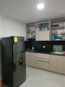 Η κουζίνα ή μικρή κουζίνα στο Apartamento 201 Palmar de los vientos