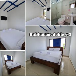 HOTEL ALDEA SANTORINI tesisinde bir odada yatak veya yataklar