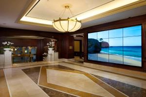 a large room with a large window with a view of the ocean at JW Marriott Miami in Miami