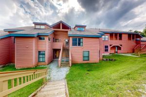 a large home with red and orange houses at Trail Creek 42 in Killington