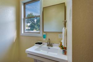 a bathroom with a sink and a mirror at 2 Mi to Main St Newton Guest House in Newton +16 photos