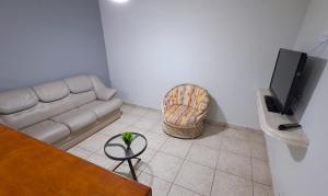 TV a/nebo společenská místnost v ubytování Casa com Piscina e Churrasqueira - Praia Pernambuco