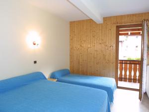 Katil atau katil-katil dalam bilik di Appartement Les Gets, 3 pièces, 8 personnes - FR-1-671-86