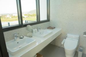 Koupelna v ubytování Golden Harvest Homestay