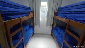 Postel nebo postele na pokoji v ubytování Casa com piscina e hidromassagem praia Enseada.