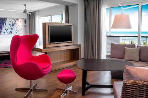 TV in/ali zabaviščno središče v nastanitvi Le Méridien Nouméa Resort & Spa
