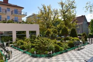Vonkajšia záhrada v ubytovaní Apartment Olymp