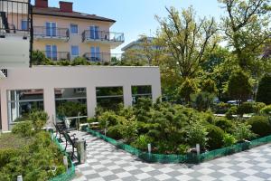 Vonkajšia záhrada v ubytovaní Apartment Olymp