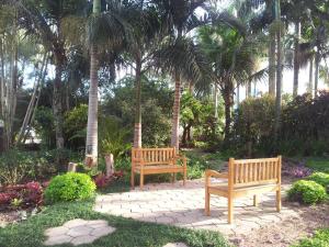 Сад в Kaakupe Praia Hotel