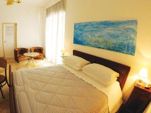 Postel nebo postele na pokoji v ubytování B&B Liberty