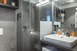 Koupelna v ubytování Oliver Apartments | contactless check-in + 37 fotografií