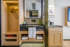 Koupelna v ubytování Yiwu Baide Theme Hotel