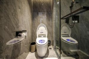 Koupelna v ubytování Yiwu Baide Theme Hotel