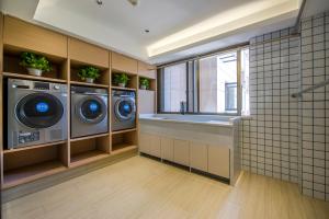 Fotografie z fotogalerie ubytování Yiwu Baide Theme Hotel v destinaci I-wu