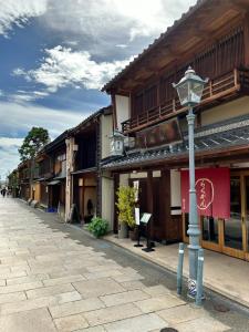 a street light in front of a building at Tsugumian in Kanazawa