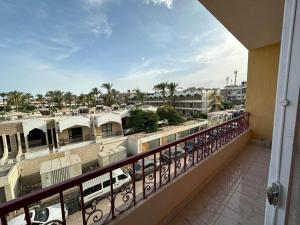 a balcony with a view of a city at Skylen apartment in Hurghada