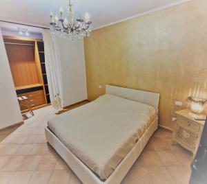 Ένα ή περισσότερα κρεβάτια σε δωμάτιο στο Casa Alfredina +6 φωτογραφίες
