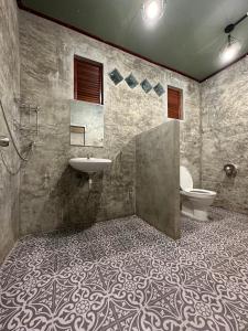Koupelna v ubytování Fatima homestay ฟาติมาโฮมสเตย์