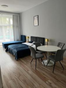 Postel nebo postele na pokoji v ubytování Grunwaldzki24 Apartments - FREE PARKING - OLD TOWN, CENTRUM