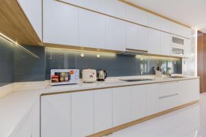 Kuchyň nebo kuchyňský kout v ubytování S2 Aria Resort