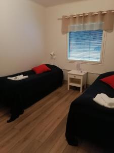 Postel nebo postele na pokoji v ubytování Hostel Tikka