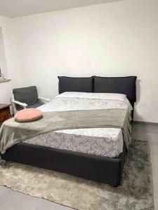 Ein Bett oder Betten in einem Zimmer der Unterkunft Appartamento nuovo e confortevole