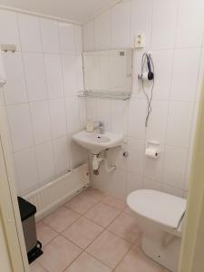 Koupelna v ubytování Hostel Tikka
