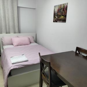 Voodi või voodid majutusasutuse Private Studio Apartment in Tecom next to Metro station toas