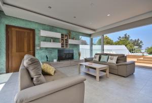 Istumisnurk majutusasutuses Villa Blu - Family Villa with Indoor heated Pool, Sauna and Games Room