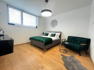 Postel nebo postele na pokoji v ubytování Apartmány Kamenec