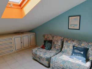 Posezení v ubytování Mirone Apartment FRONTE MARE beachfront house