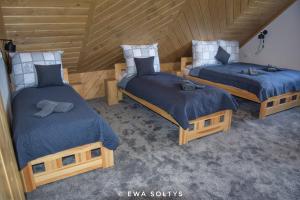 Postel nebo postele na pokoji v ubytování Apartament Przełęcz nad Łapszanka