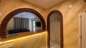 Telewizja i/lub zestaw kina domowego w obiekcie Apartamento Golf Beach
