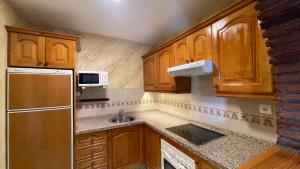 Kuchnia lub aneks kuchenny w obiekcie Apartamento Golf Beach