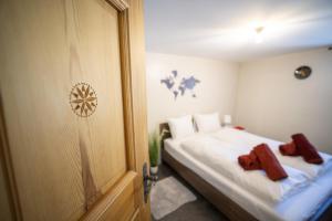 Cama o camas de una habitación en Chasa Muglin Ardez