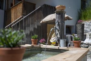 Jardín al aire libre en Chasa Muglin Ardez