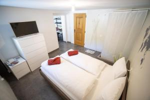 Cama o camas de una habitación en Chasa Muglin Ardez