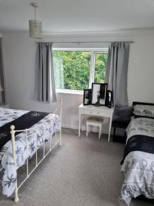 Postel nebo postele na pokoji v ubytování Richlands Homestay + 36 fotografií