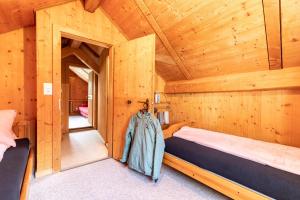 Cama o camas de una habitación en Chasa Muglin Ardez